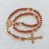 Miraculous Medal Orange Wood and Gold Rosary