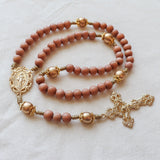 Miraculous Medal Orange Wood and Gold Rosary