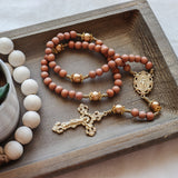 Miraculous Medal Orange Wood and Gold Rosary