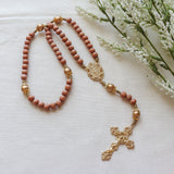 Miraculous Medal Orange Wood and Gold Rosary